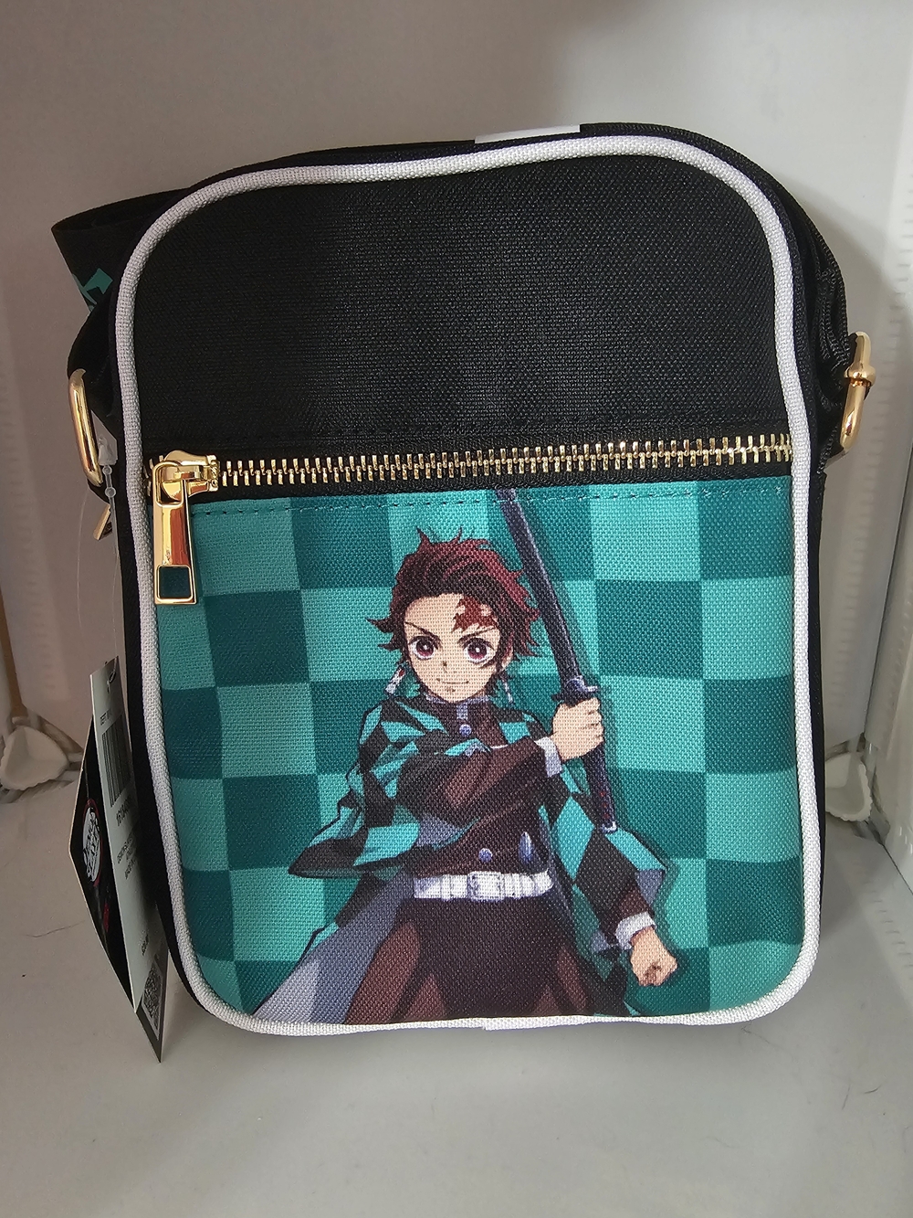 Demon Slayer: Kimetsu no YBioworld Black and Teal Crossbody Bag with Anime Print